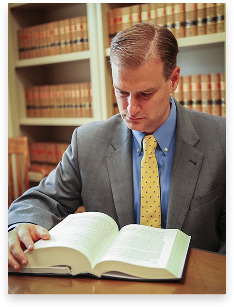 Ted Spaulding with law book
