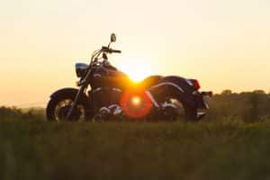 motorcycle in a field with Georgia sunset